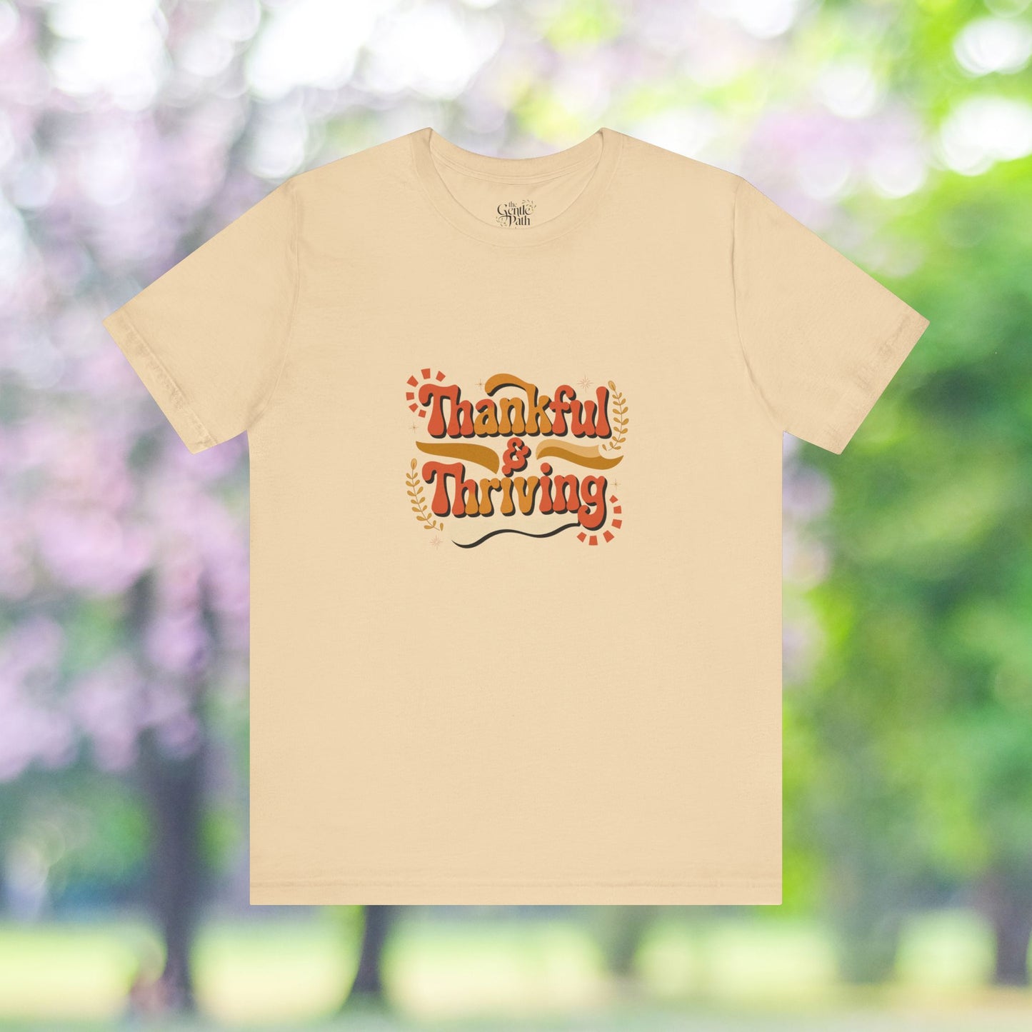 Fall T-shirt with thankful and thriving retro graphic.