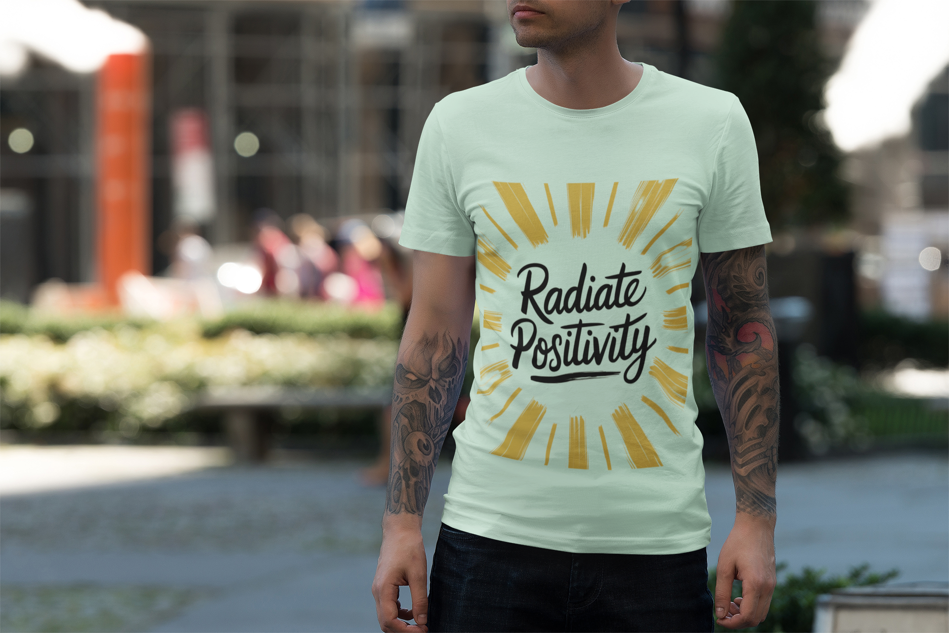 Radiate Positivity tee featuring sun ray graphic design.