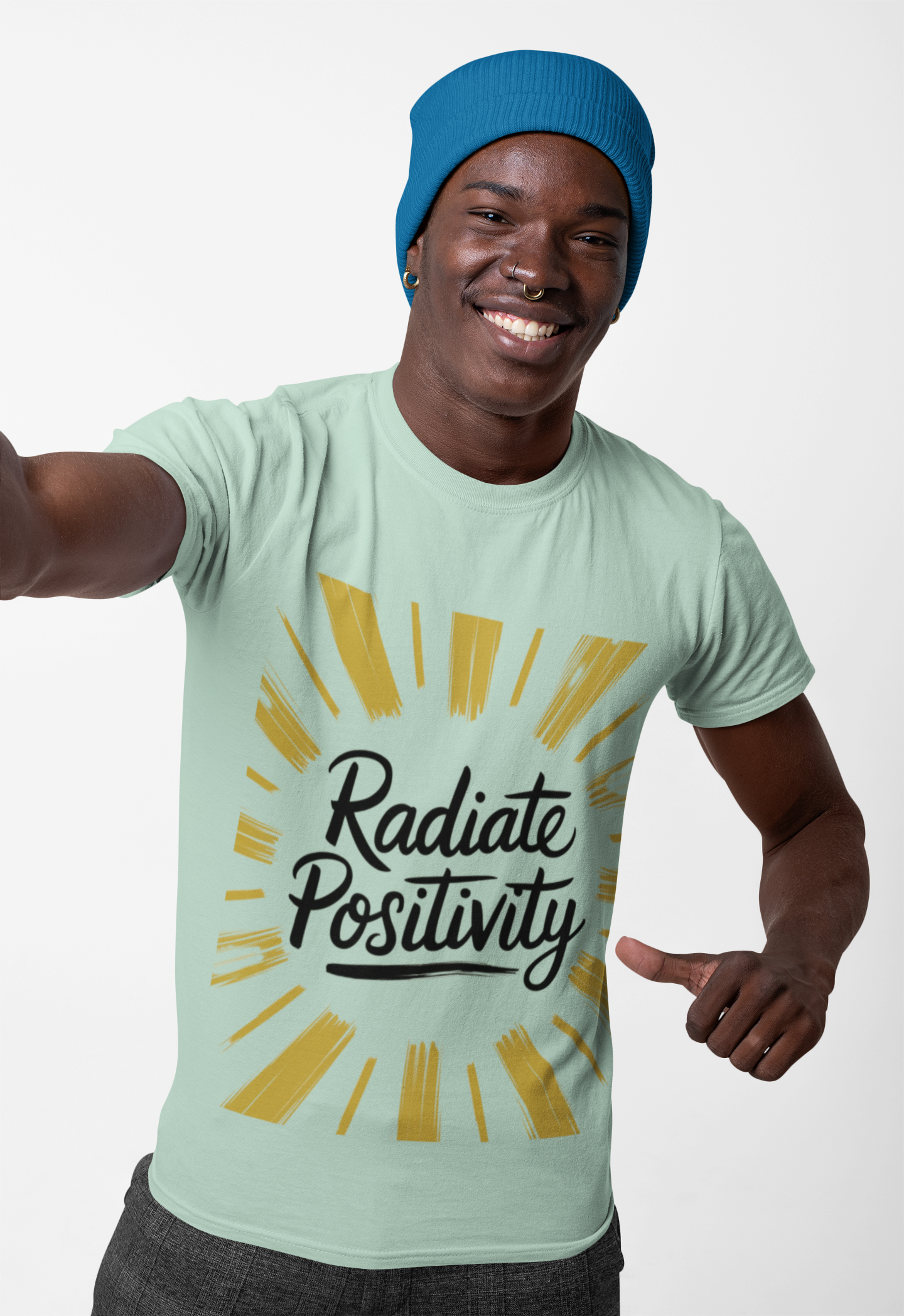 Radiate Positivity Tee with sunburst graphic on a smiling model.