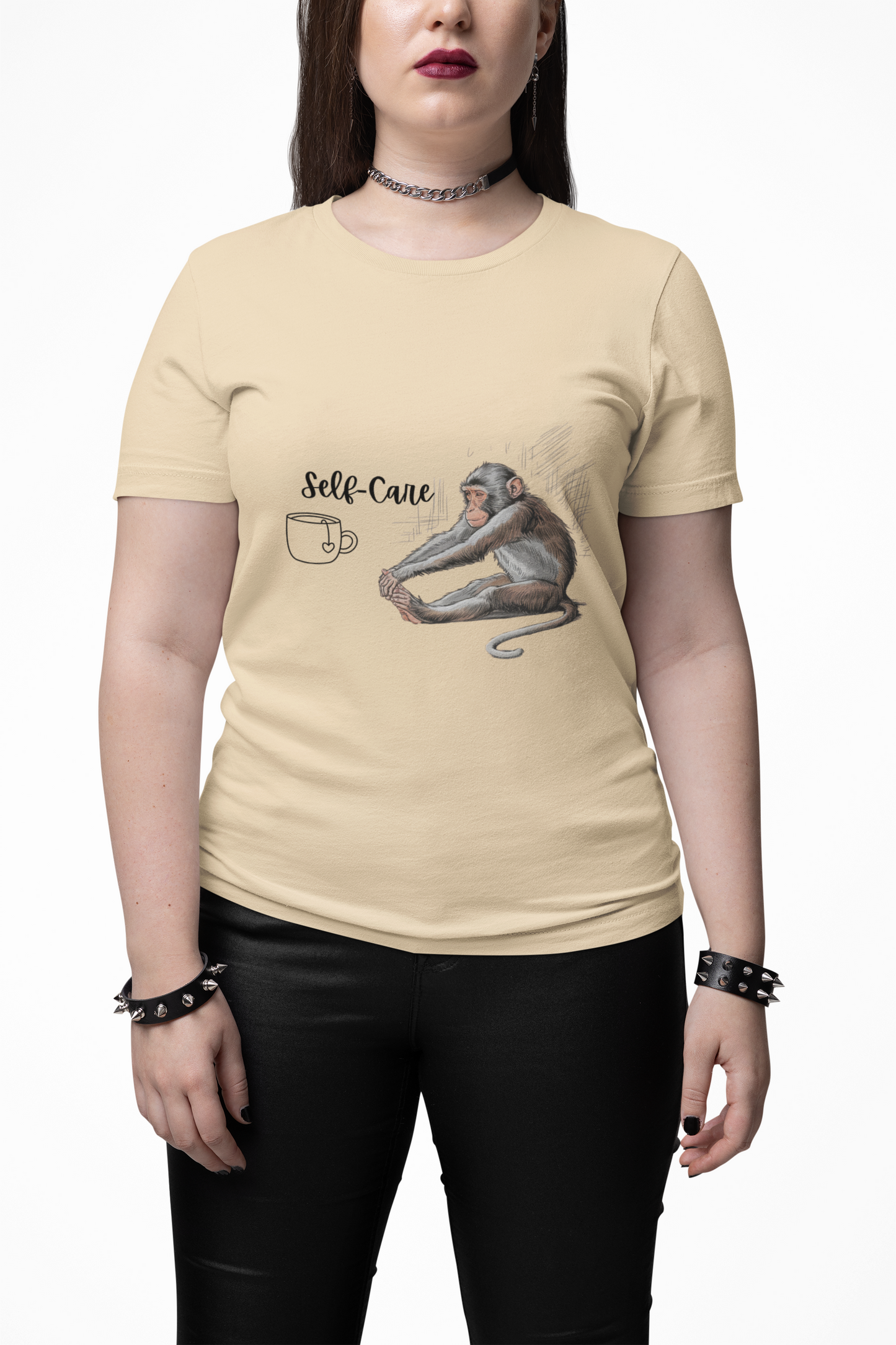 Beige self-care tee with yoga monkey graphic.