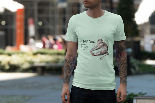 Yoga monkey self-care text on light green T-shirt