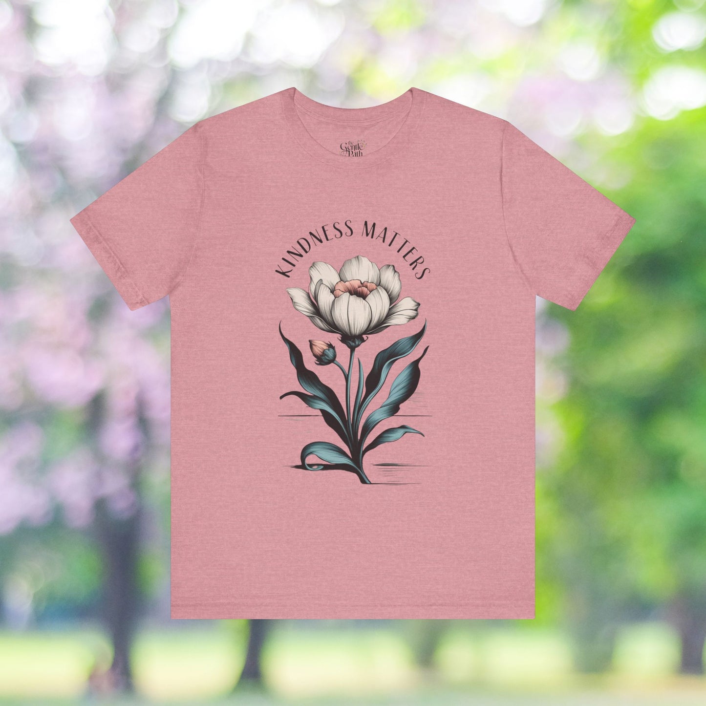 Pink t-shirt with Kindness Matters floral design